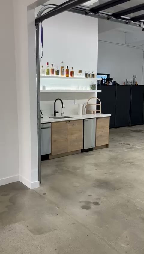 Finished modern kitchenette and bar build-out in commercial industrial space