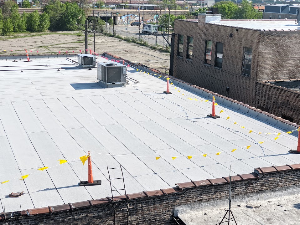 Finished commercial TPO roof replacement with HVAC units